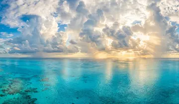Ocean Sky and Clouds 4K Wallpaper – Endless Blue Paradise